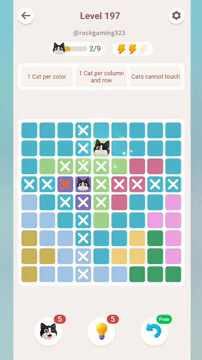 Meowdoku Level 197 step 2 screenshot showing the cat placement at E2 with 2 of 9 cats visible on the board.